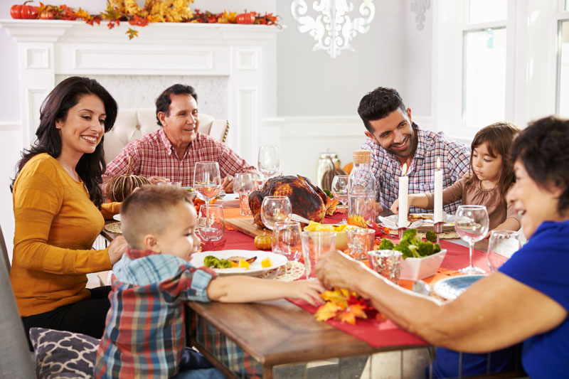 family round a thanksgiving table